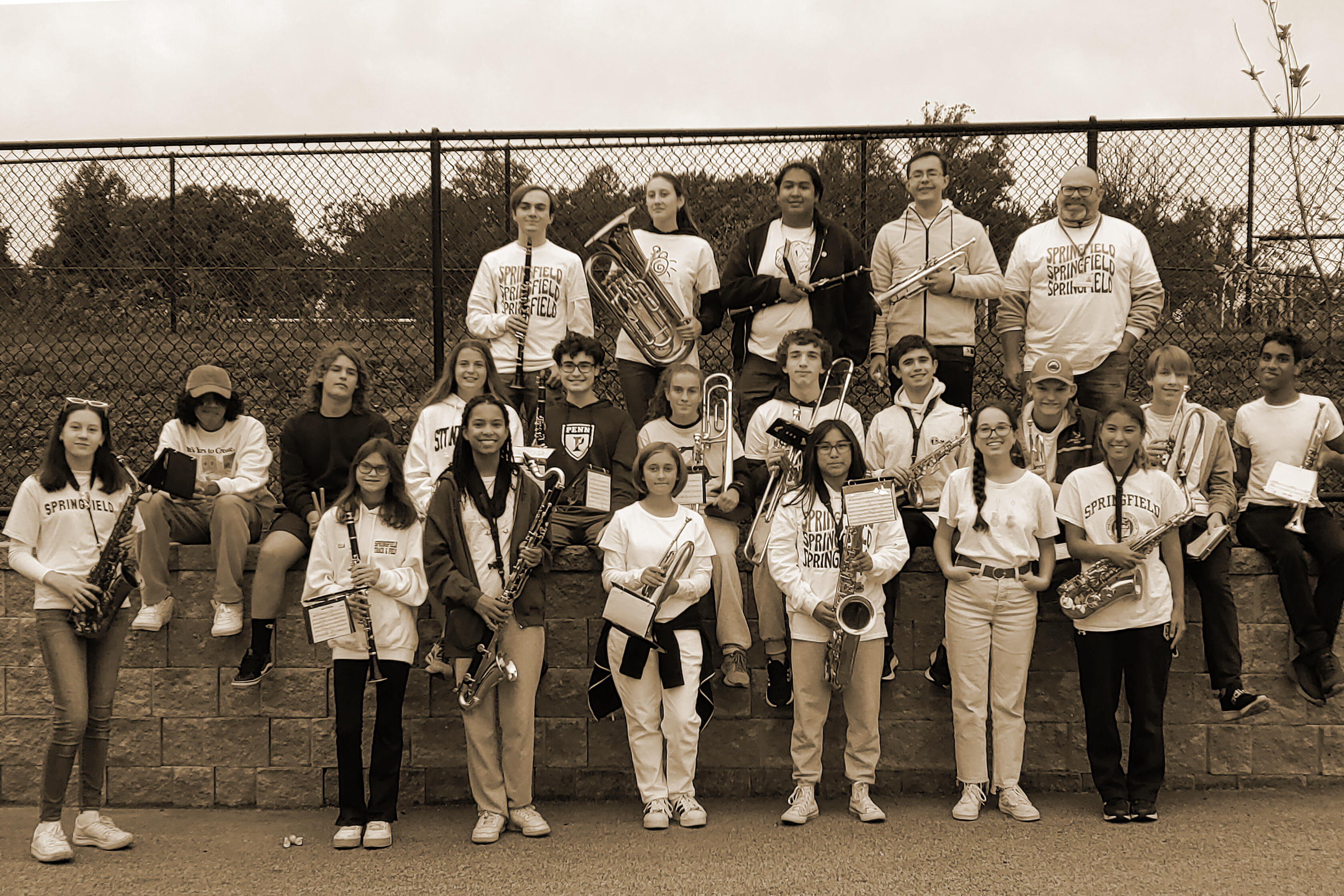 sepia tone photo of band at Pep Rally at the middle school